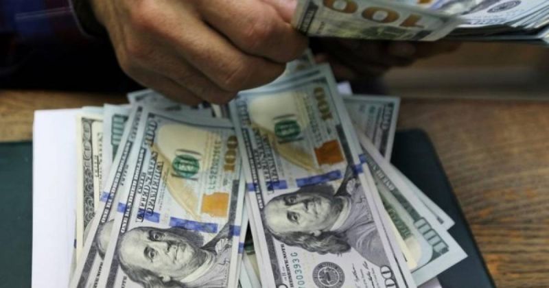الدولار يتراحع الى اقل من 3 شواكل