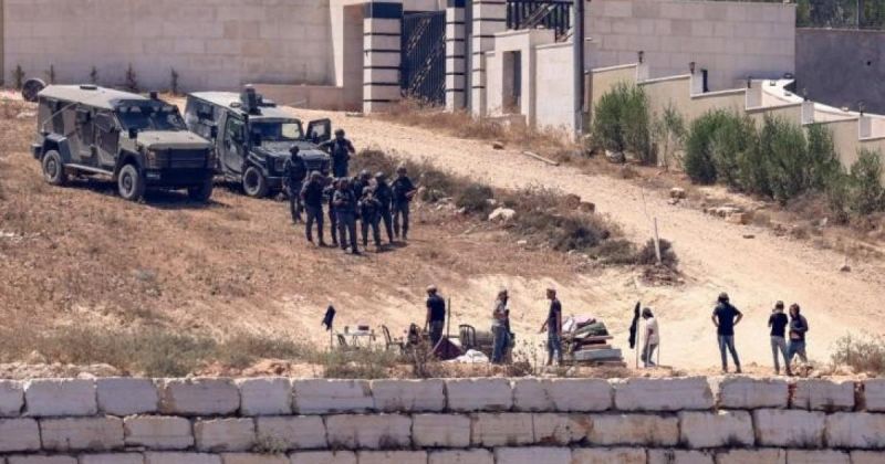 14 يوما على حصار 3 منازل فلسطينة في قصرة