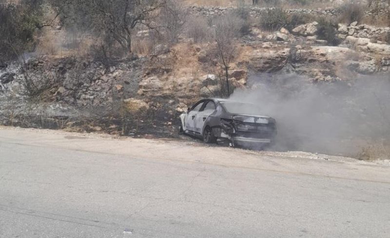 اعتقال سيدة وإحراق مركبة زوجها غرب رام الله